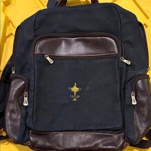 Links & Kings Waxed Canvas Navy and Brown Backpack with Ryder Cup logo